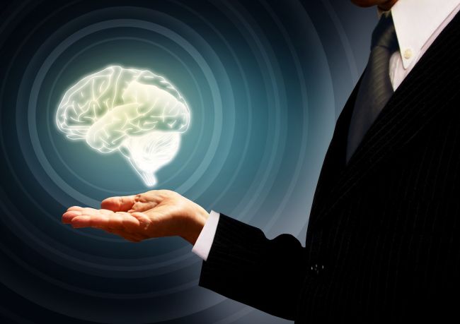 illustration of a man holding a brain hologram in his palm, representing artificial intelligence